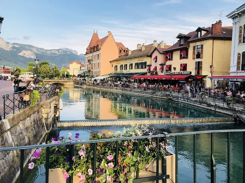 Explore the charming canals and crystal-clear lake of the "Venice of the Alps".